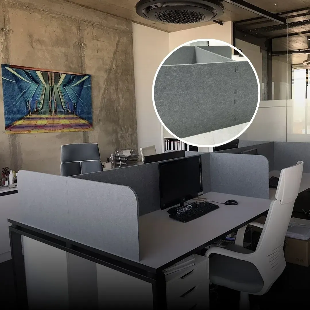 Eco-friendly acoustic desk dividers for an office